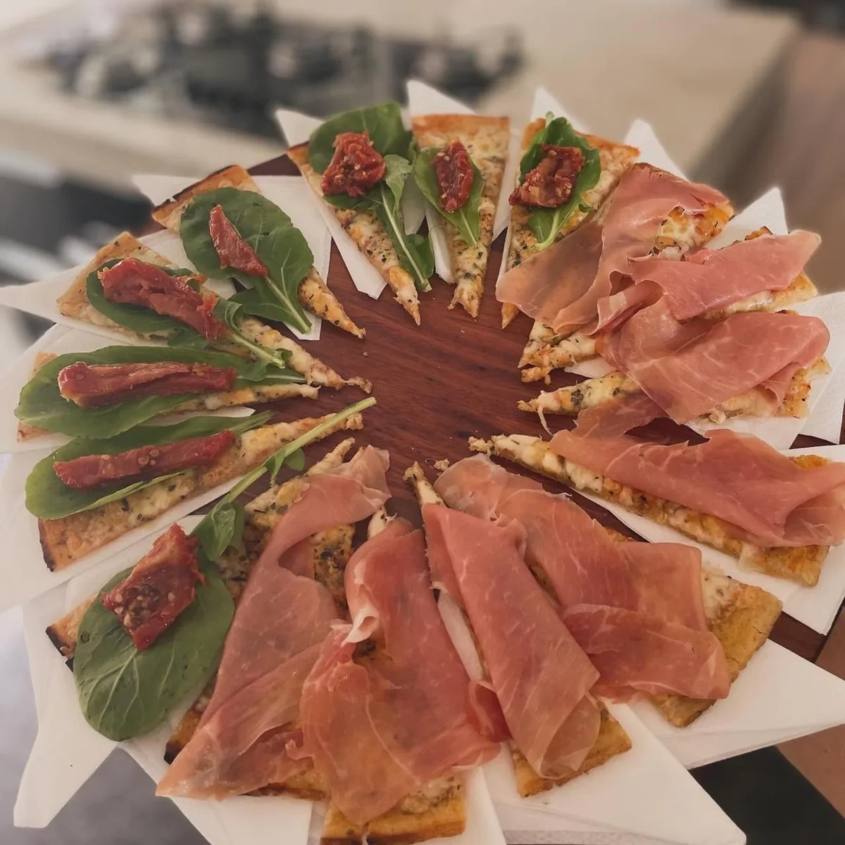 Rodízio de pizza com presunto de parma e rúcula